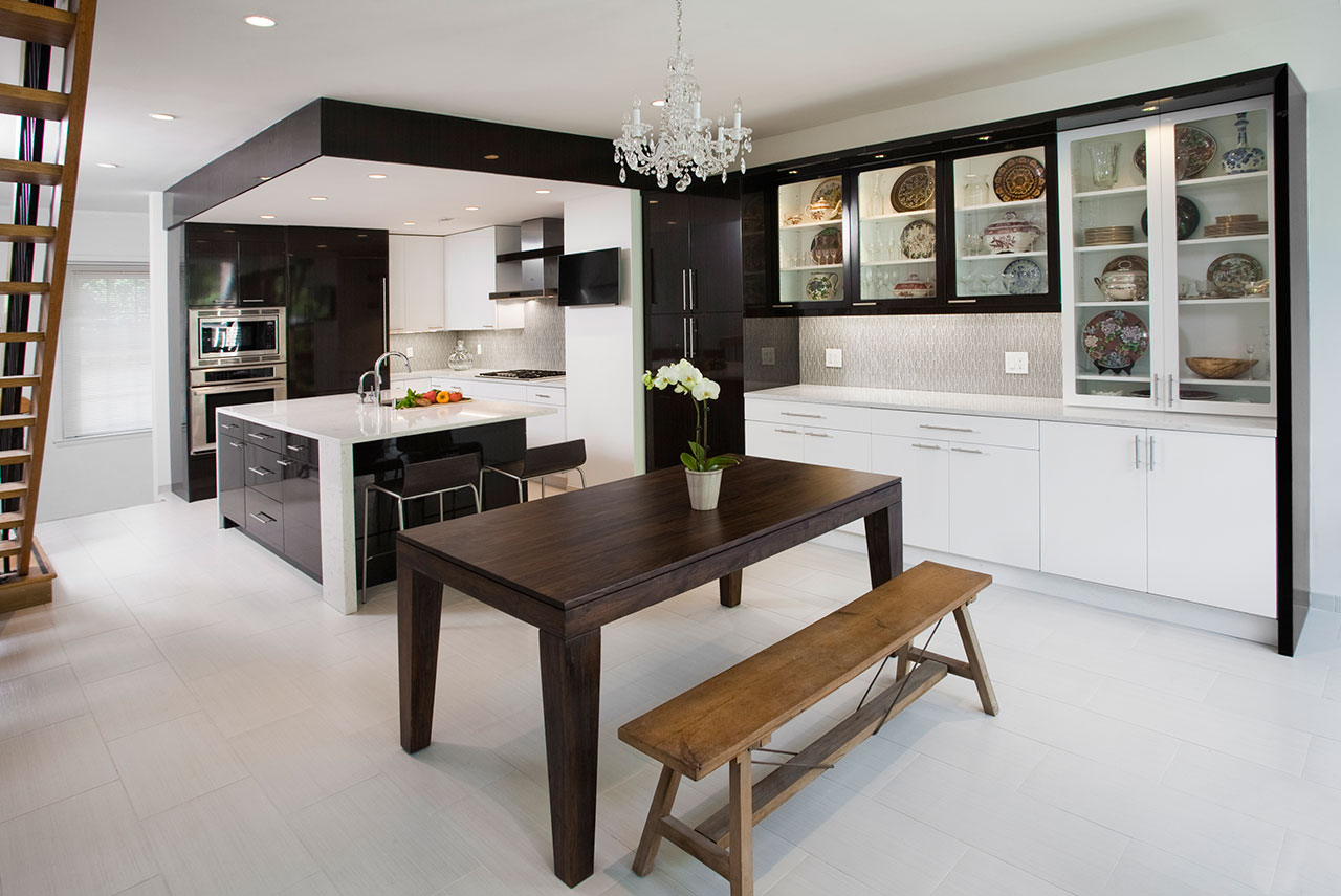 contemporary Country Kitchen: wooden dining table and sleek modern appliances