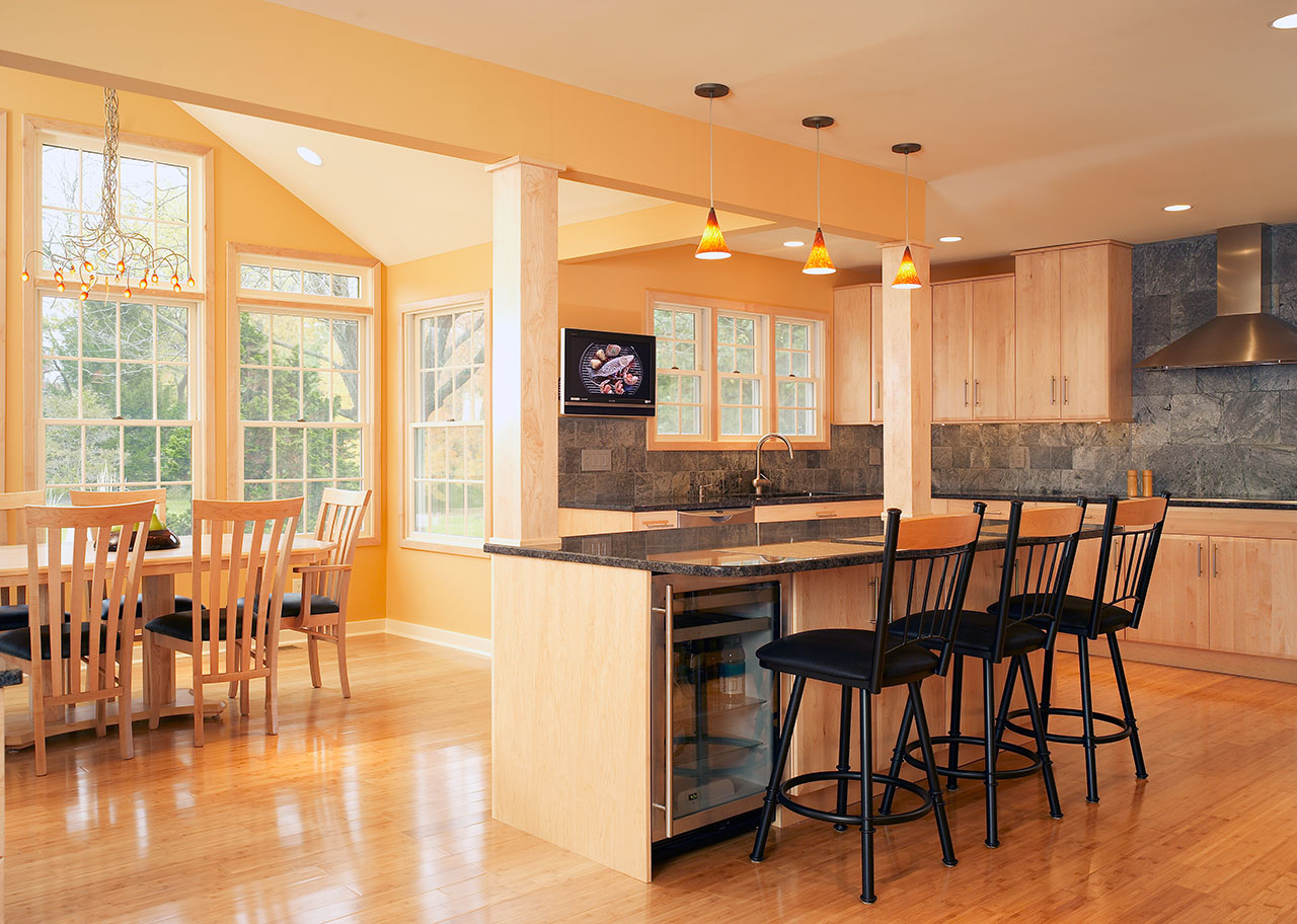 Modern Kitchen with light wood and black accent