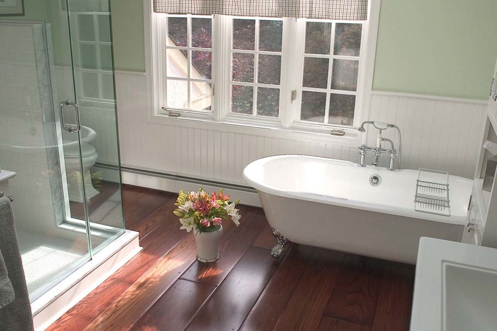 farmhouse bathroom with clawfoot tub